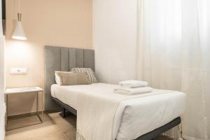 Posteľ alebo postele v izbe v ubytovaní Serene & spacious apartment - Center by REMS