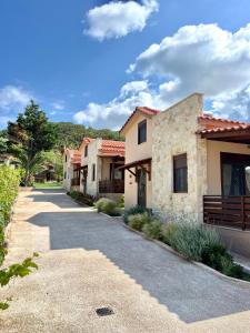 a row of houses on a street at Palma Seaside Villa 3 in Sarti