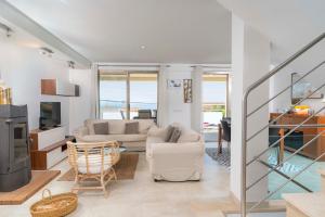A seating area at Adosado Bellavista B By homevillas360