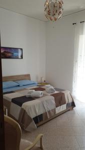 Katil atau katil-katil dalam bilik di Holiday house Isabel