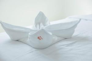 Postel nebo postele na pokoji v ubytování S1 Trang Hotel