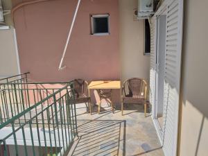 Ein Balkon oder eine Terrasse in der Unterkunft Nostos Apartments