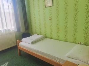 Letto o letti in una camera di Hotel Slodes