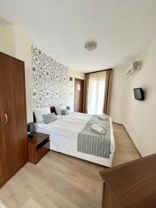 Postel nebo postele na pokoji v ubytování Sea View