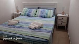Llit o llits en una habitació de Bilocale in centro