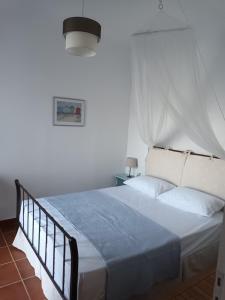 Postel nebo postele na pokoji v ubytování Light Blue