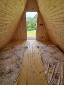 Postel nebo postele na pokoji v ubytování GLAMPING HOUSE ˇVITAˇ
