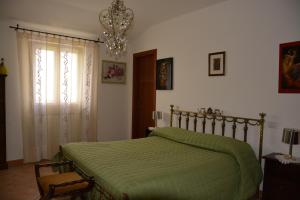 Giường trong phòng chung tại Nonna Alda