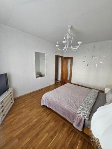 Voodi või voodid majutusasutuse Negruzzi 2 bedrooms toas