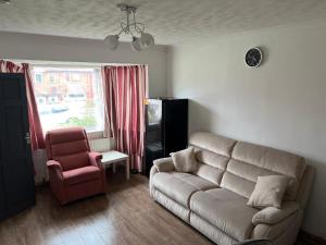 Seating area sa Arely House Rooms With Shared Bathroom