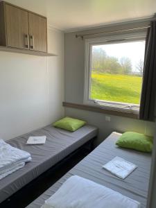Postel nebo postele na pokoji v ubytování Le clos de Banes