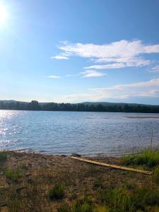 a view of a large body of water at Warm ART room at home. in Ylitornio