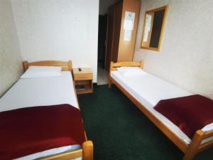 Letto o letti in una camera di Hotel Slodes