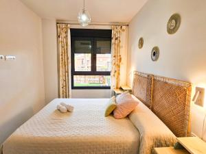 Posteľ alebo postele v izbe v ubytovaní Terrace Mares de Benajarafe