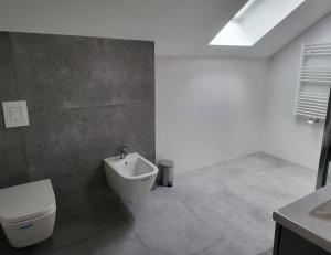 a bathroom with a toilet and a bidet at New House for Vip's in Słubice
