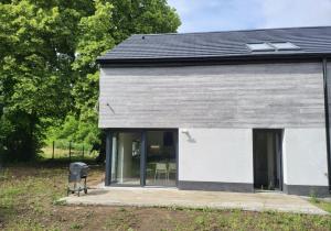 a house with black and white walls and windows at New House for Vip's in Słubice