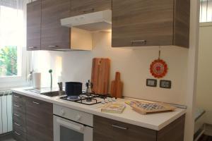 Kuchyň nebo kuchyňský kout v ubytování CIAO BELLI flat city centre and parking - Appartamento centrale con posto auto