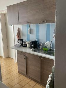 Una cocina o zona de cocina en Yannis Maria Rooms