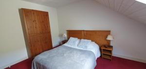 Postel nebo postele na pokoji v ubytování T4 duplex à Vielle-Aure résidence de tourisme 4*