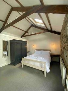 Voodi või voodid majutusasutuse Foundry cottage toas