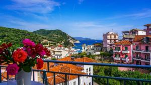 a view of the town of positano from a balcony at Villa Matina in Parga