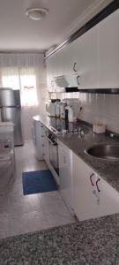 Kuchyň nebo kuchyňský kout v ubytování Apartamento Atico Altar