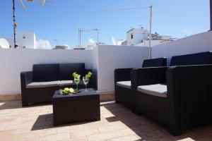 Posedenie v ubytovaní IMPLUVIUM Conil-Terraza Privada-Parking- mayores de 25 años