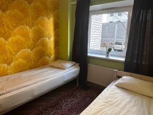 Postel nebo postele na pokoji v ubytování 4BR Apartment in Tallinn City Centre with free parking