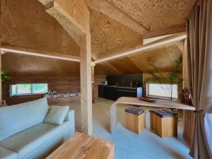 a living room with a couch and a table at Seagull Studio Byala in Byala
