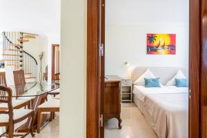 Ένα ή περισσότερα κρεβάτια σε δωμάτιο στο Penthouse Residences Vista Mar with Seaview +61 φωτογραφίες