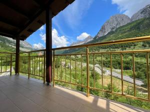 a balcony with a view of mountains at Arditi's Villa in Shkodër