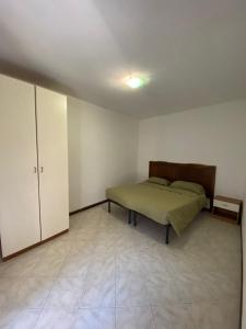 En eller flere senger på et rom på casa vacanze il ciliegio