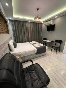 TV a/nebo společenská místnost v ubytování Arat Apartments
