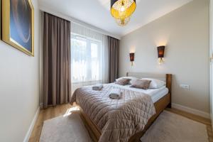 Postel nebo postele na pokoji v ubytování Apartament Luxury Two-bedroom