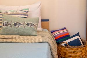 A bed or beds in a room at SARDINIA RE - Casa Luisa With Pool