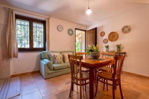 A seating area at SARDINIA RE - Casa Luisa With Pool