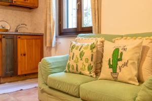 A seating area at SARDINIA RE - Casa Luisa With Pool