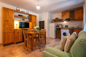 A kitchen or kitchenette at SARDINIA RE - Casa Luisa With Pool