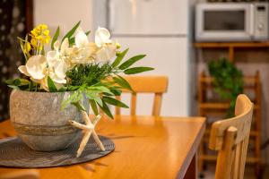 A kitchen or kitchenette at SARDINIA RE - Casa Luisa With Pool