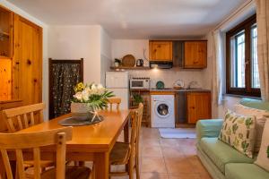 A kitchen or kitchenette at SARDINIA RE - Casa Luisa With Pool