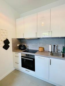 Nhà bếp/bếp nhỏ tại Ferienwohnung am Ilmenauradweg +2 ảnh