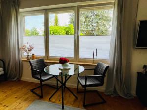 Khu vực ghế ngồi tại Ferienwohnung am Ilmenauradweg