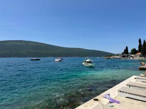 a group of boats in a body of water at Attic Baosici in Herceg-Novi