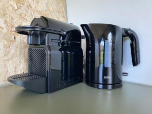 Удобства за правене на кафе и чай в Natuurhuisjes Lust en Last