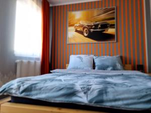 Posteľ alebo postele v izbe v ubytovaní WRN APARTAMENTY
