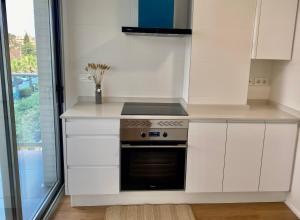 Kuchnia lub aneks kuchenny w obiekcie VoraMar 3 Playa Puerto de Sagunto