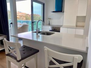 Kuchnia lub aneks kuchenny w obiekcie VoraMar 3 Playa Puerto de Sagunto