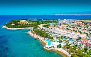 an aerial view of a resort next to the ocean at Residence-Apartment-Giuliano-Punta Skala, in Petrcane
