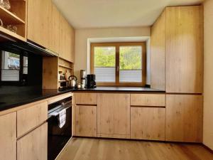 Kuchyňa alebo kuchynka v ubytovaní Bio Apartment - Der Steinadler