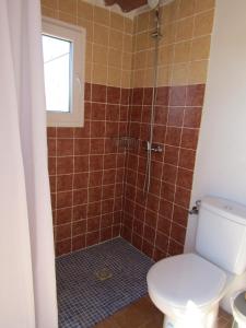 a bathroom with a shower with a toilet in it at Casa Antonia ET- 6805 in Sant Francesc Xavier +4 photos